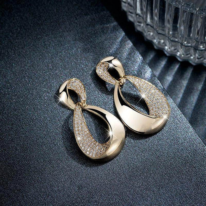 Atmospheric gold unique earring girl 636352115977 - COCOMELODY
