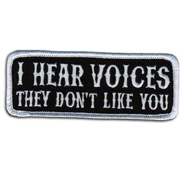 I Hear Voices Patch 4 Inch: Description
I Hear Voices, They Don't Like You" embroidered in white on a black background with w