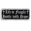 Life Is Fragile Patch 4 Inch: Description
"Life is Fragile, Handle With Prayer" embroidered in fancy white lettering and cros