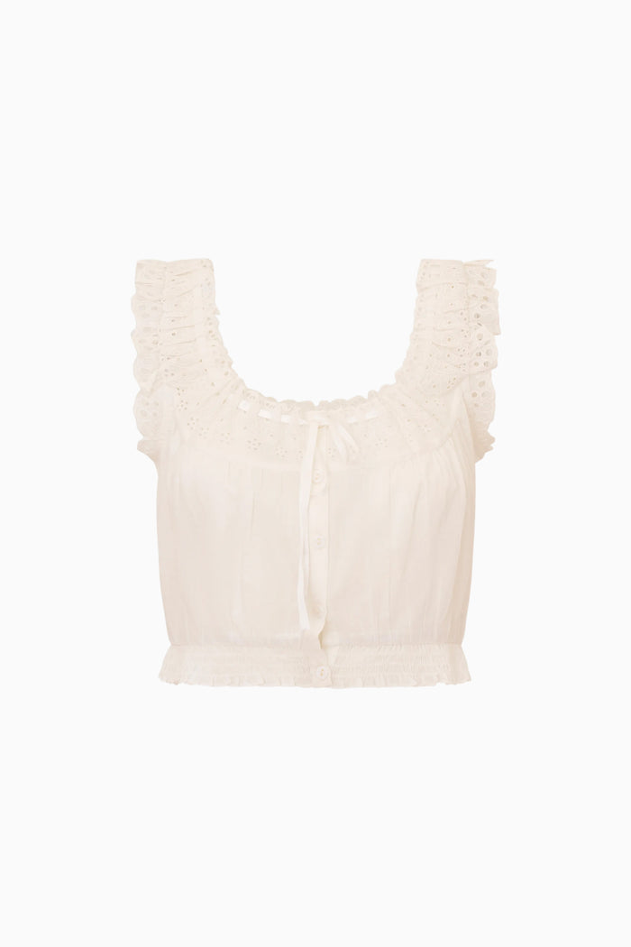 Beige sleeveless top with ruffled details on a white background