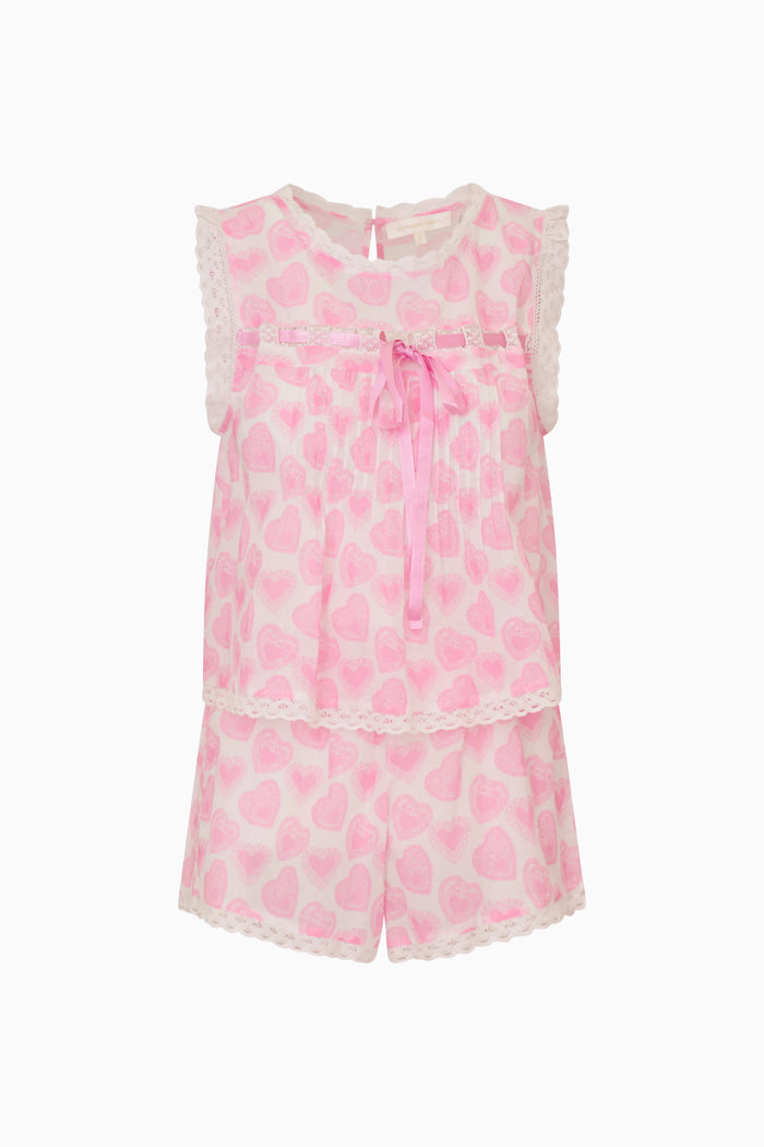 Pink and white patterned set with lace details on a white background