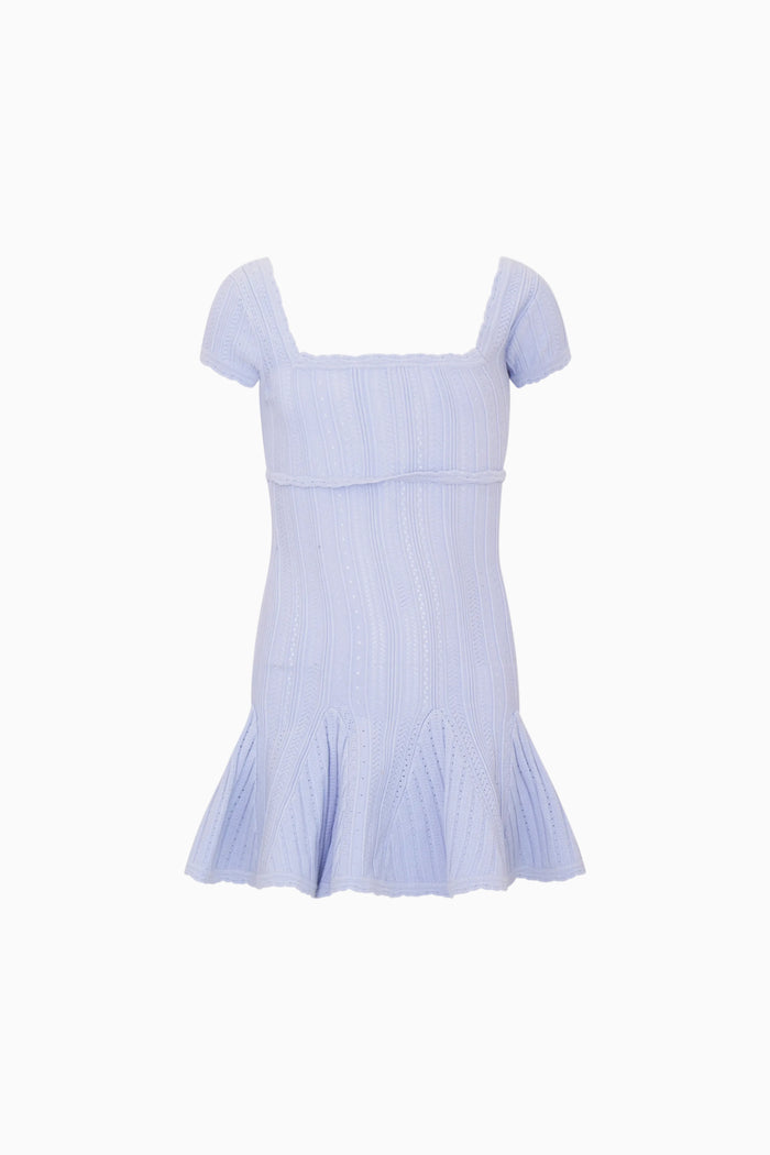 Light blue knitted dress on a white background