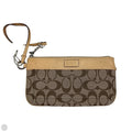 Wristlet Designer By Coach, Size: Medium